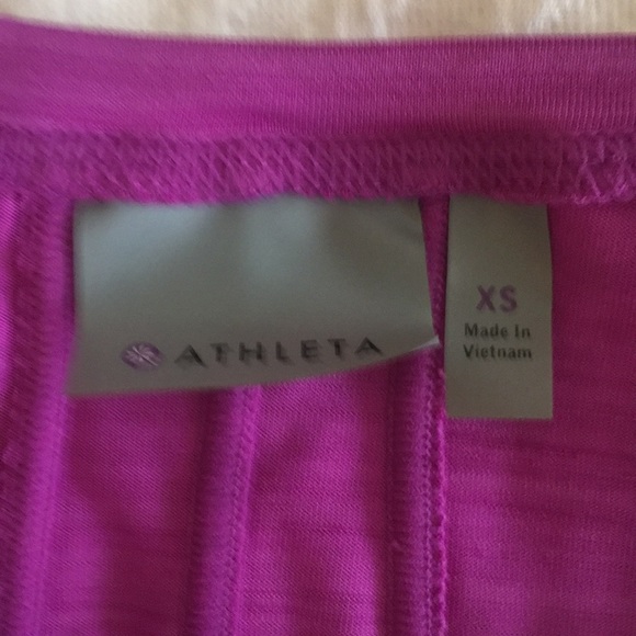 Athleta zip t with stash pocket in the back. - Picture 2 of 4